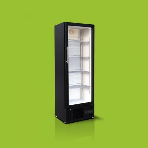 A tall black refrigerator with a glass door and multiple shelves, positioned against a solid green background.
