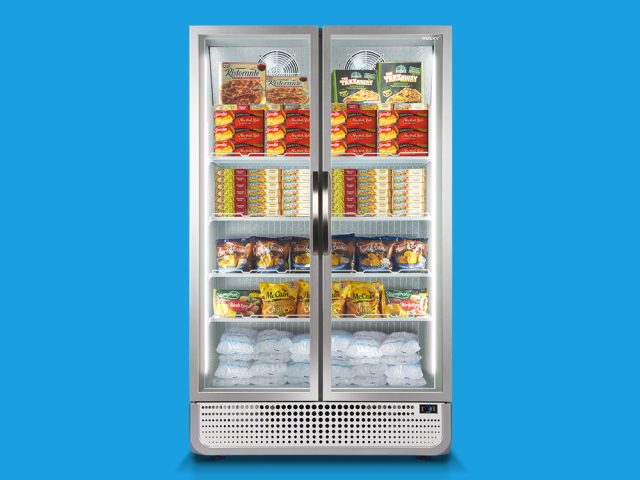 A double-door commercial freezer displays a variety of frozen foods, including boxes and bags, organized on shelves against a bright blue background.