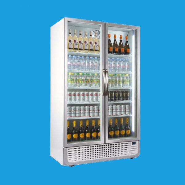 A double-door glass refrigerator displays various beverages, including water bottles, soda cans, and wine bottles, neatly arranged on shelves, set against a plain blue background.