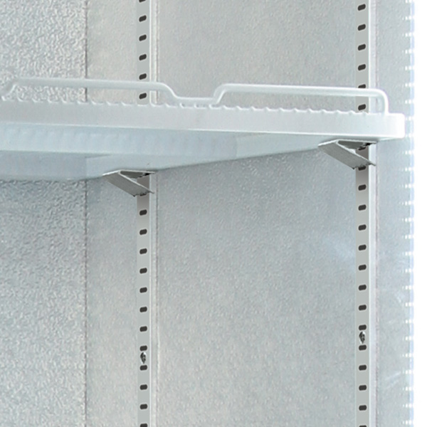 A white metal shelf is mounted on a wall, held up by metal brackets, and surrounded by aluminum paneling with vertical perforations.