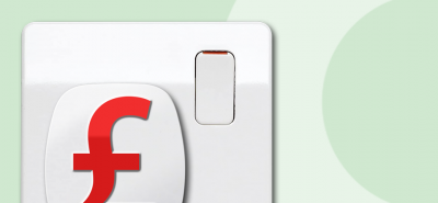 White light switch with a red currency symbol resembling the British pound (£), partially seen against a light green background with circular designs.